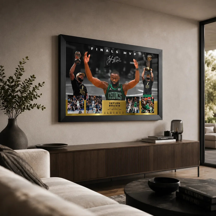 Jaylen Brown Finals MVP basketball wall art in a modern living room above a timber console and neutral seating.