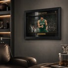 Jayson Tatum Celtics wall art in black frame on a dark man cave wall with shelving nearby.