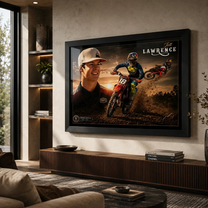 Black framed Jett Lawrence motocross wall art displayed above a timber console in a warm modern living room.