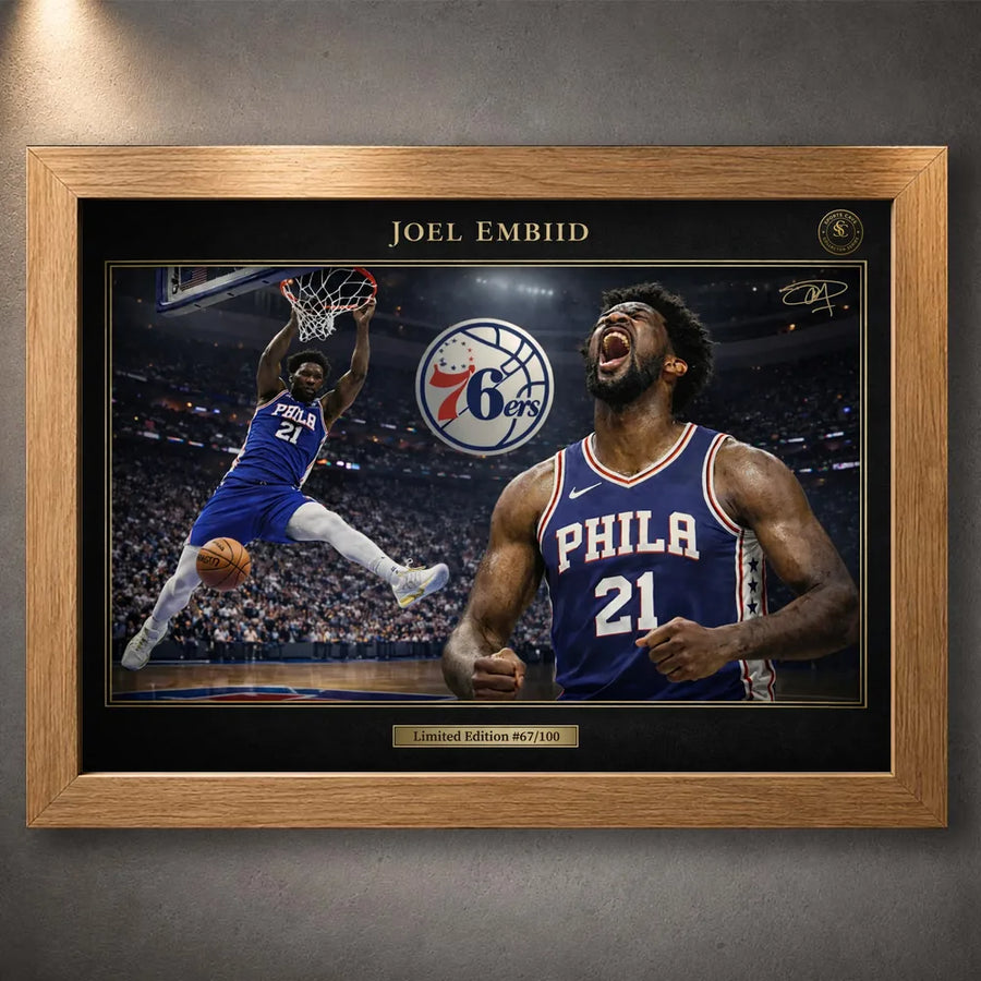 76ers basketball wall art shown in an oak frame with black matting on a grey wall.