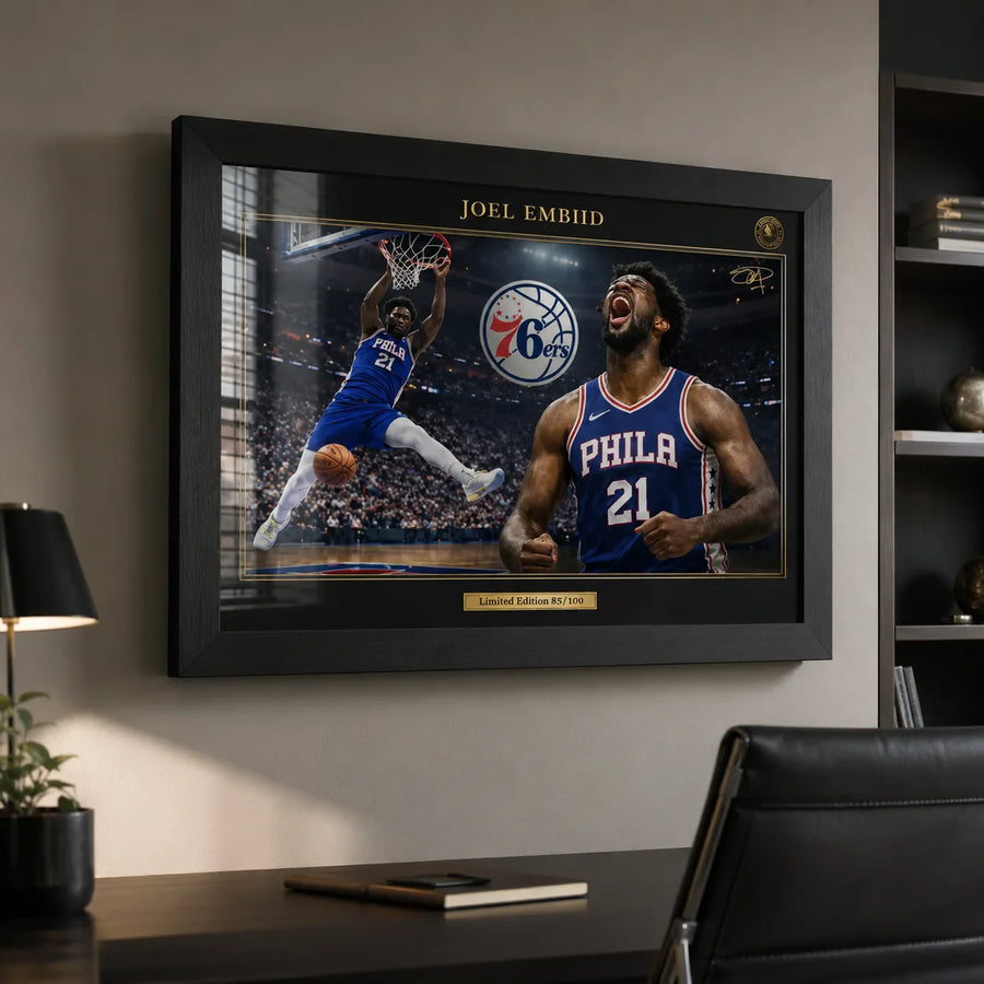 Joel Embiid 76ers framed NBA wall art displayed above a desk in a modern office setting.