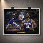 Unframed Joel Embiid 76ers NBA wall art print clipped against a grey wall background.