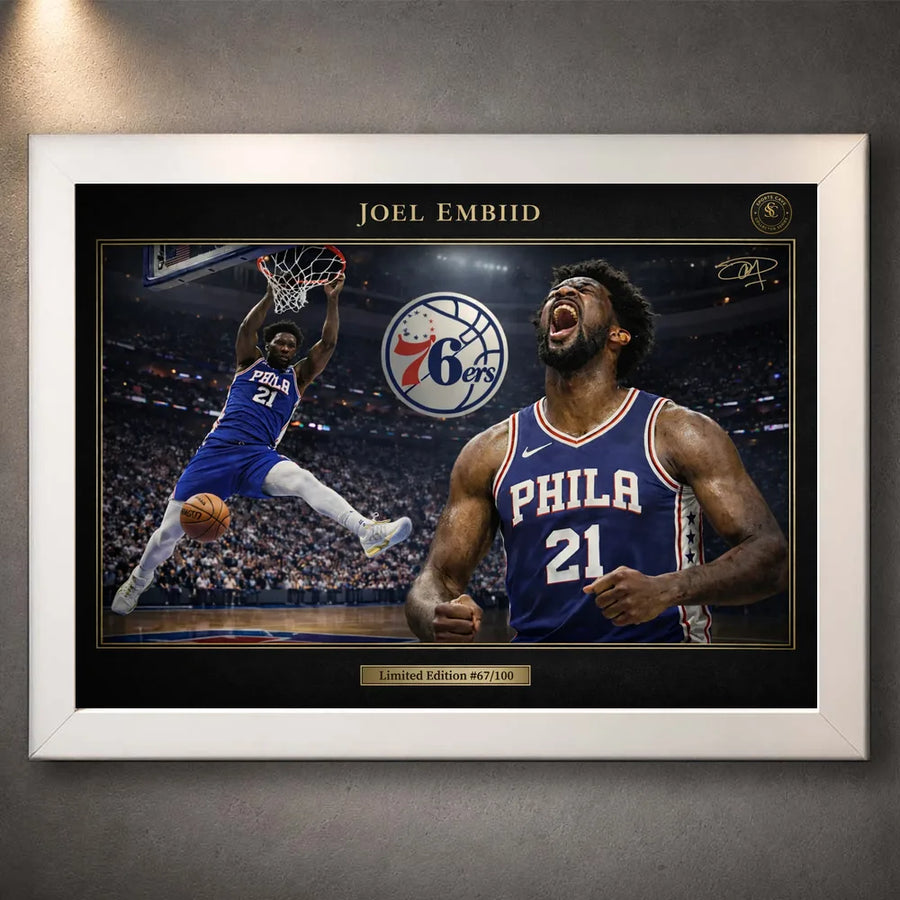 76ers basketball wall art shown in a white frame with black matting on a grey wall.