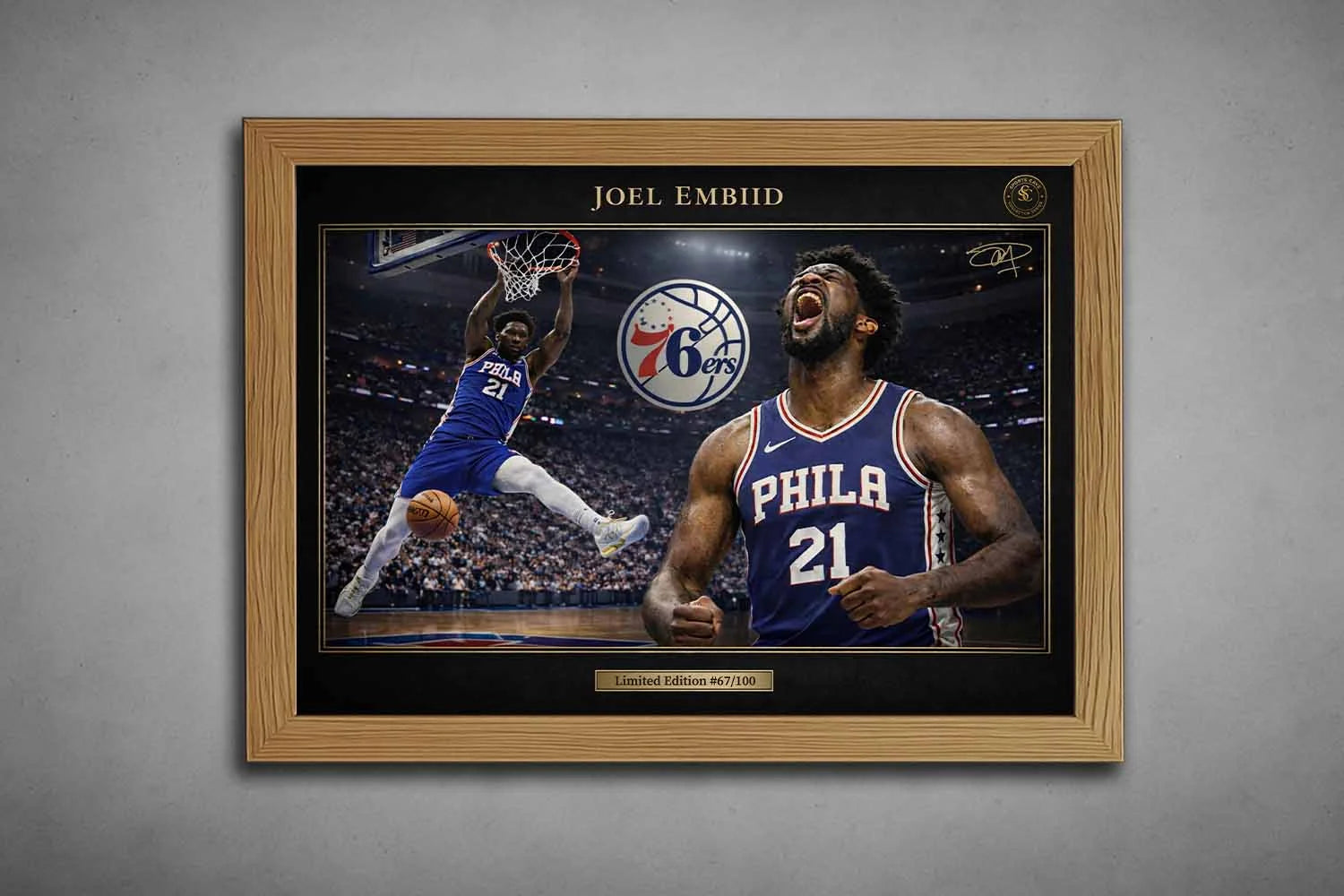 Joel Embiid Philadelphia 76ers premium sports collectibles artwork in oak frame with arena dunk scene and bold hero portrait