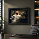 Karim Benzema football wall art in a black frame displayed above a desk in a modern office.