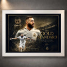 Karim Benzema football wall art in a white frame, featuring Real Madrid tribute artwork in gold tones.