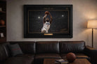 Kawhi Leonard Clippers framed sports art displayed above a leather sofa in a modern man cave.