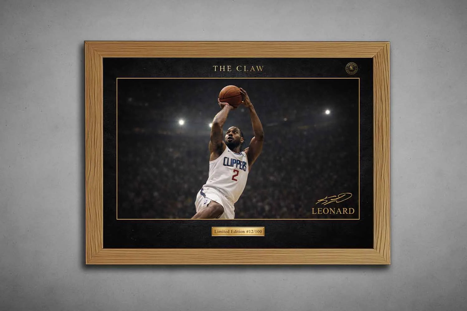 Kawhi Leonard limited edition sports prints in an oak frame, elegant NBA sports wall art display.