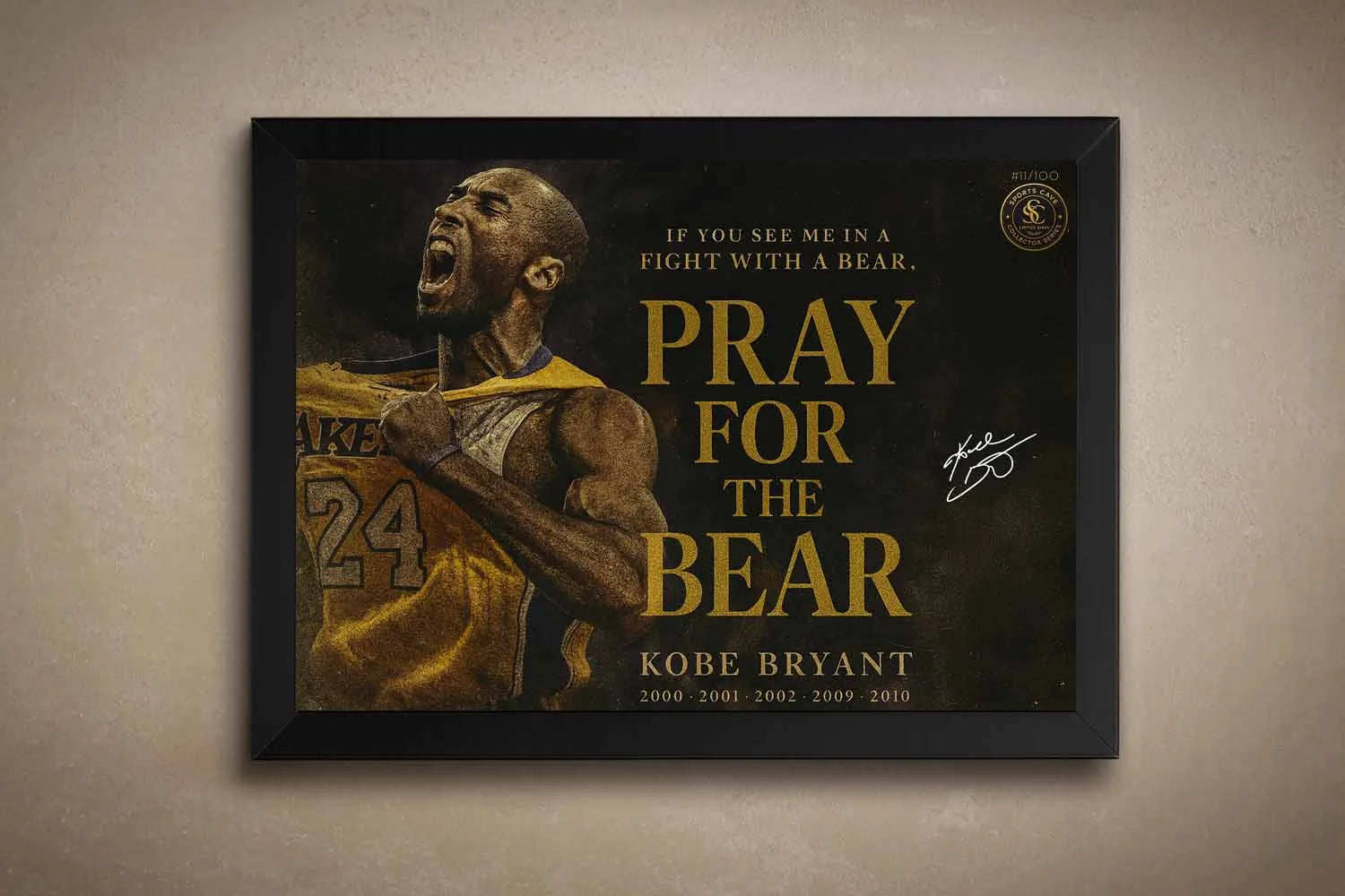 Kobe Bryant Pray For The Bear black framed NBA sports wall art on beige wall.