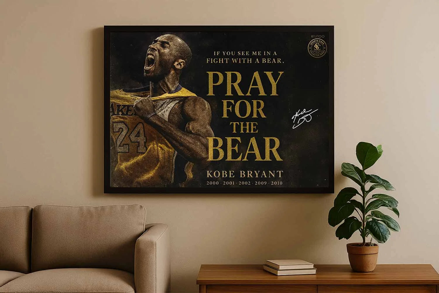 Kobe Bryant Pray For The Bear NBA sports wall art framed in black above beige sofa in modern living room.