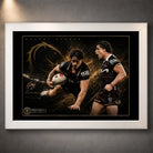 White framed Kotoni Staggs Brisbane Broncos rugby league wall art featuring two action portraits on a black and gold design.