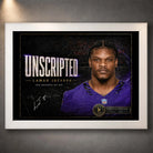 White framed Lamar Jackson wall art featuring the Unscripted NFL MVP tribute against a dark display wall.