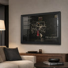 Last shot basketball wall art in a black frame above a timber cabinet in a neutral living room.