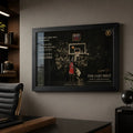 Last shot basketball wall art in a black frame displayed on an office wall with shelves and a leather chair.