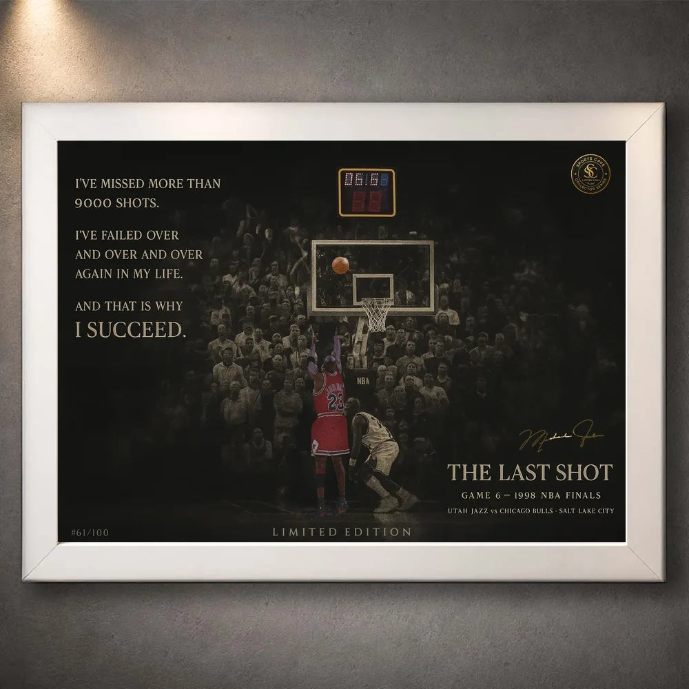 Last shot basketball wall art displayed in a white frame on a textured grey wall.