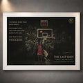 Last shot basketball wall art displayed in a white frame on a textured grey wall.