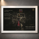 Last shot basketball wall art displayed in a white frame on a textured grey wall.