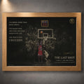 Last shot basketball wall art displayed in a wood frame on a textured grey wall.