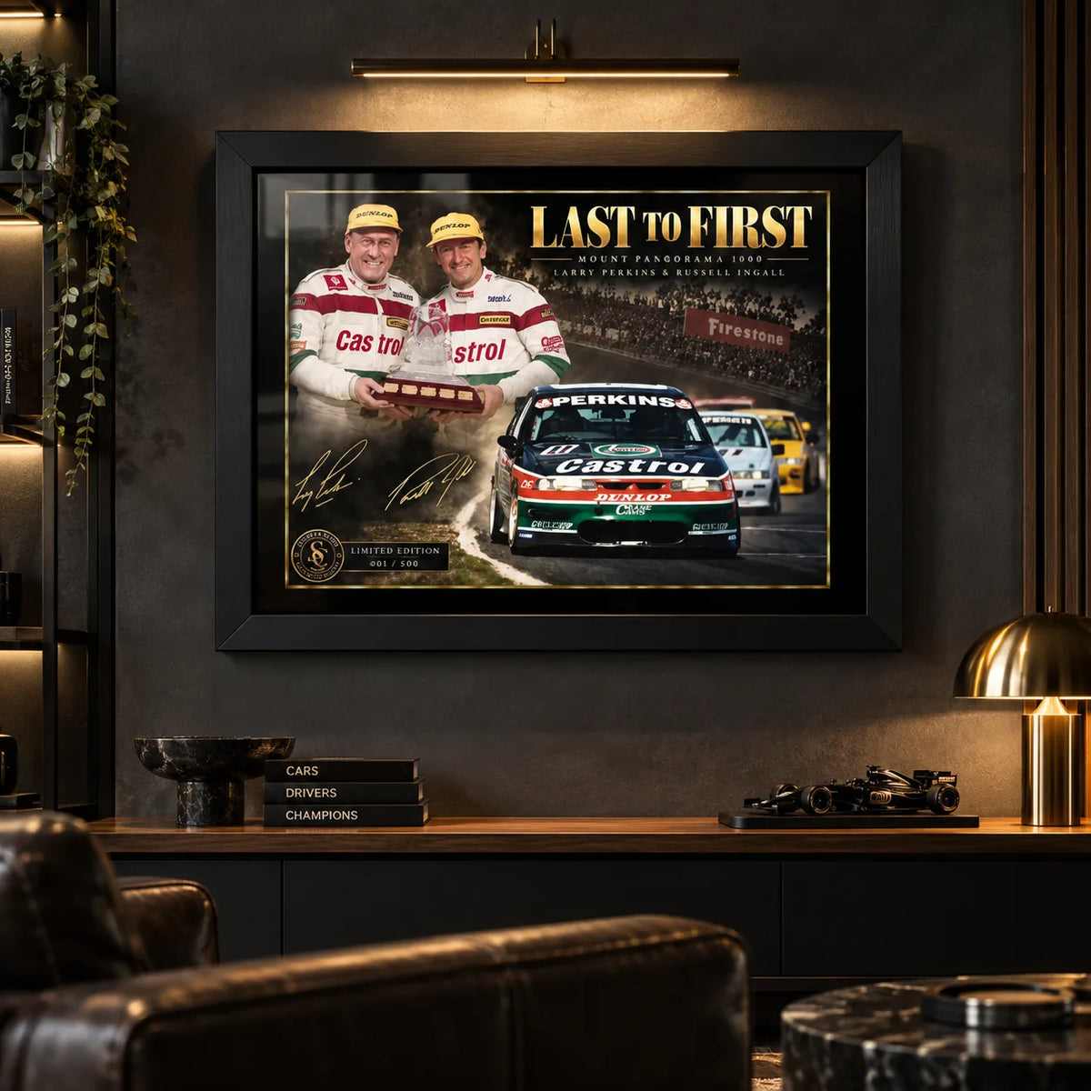 Last to First motorsport wall art displayed in a dark man cave with warm lighting and racing-inspired styling.
