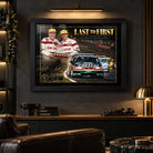 Last to First motorsport wall art displayed in a dark man cave with warm lighting and racing-inspired styling.