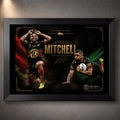 Black framed Latrell Mitchell wall art featuring two action poses in South Sydney colours on a dark red and green design.