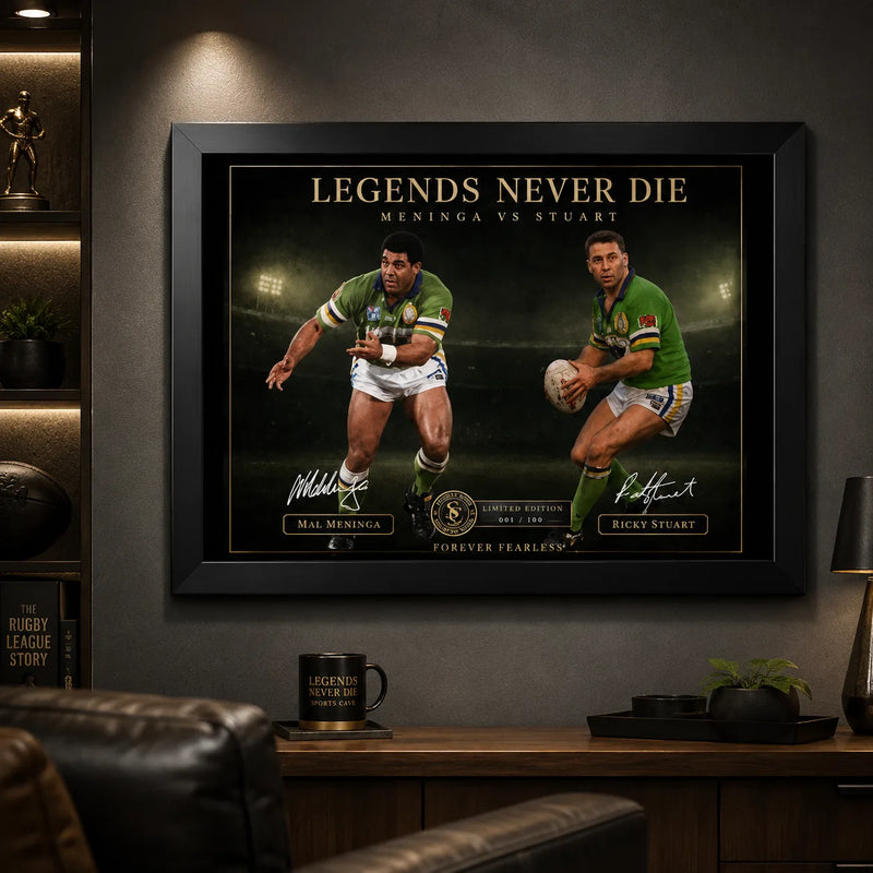 Meninga vs Stuart wall art displayed in a dark man cave with warm lighting and premium sports memorabilia styling.