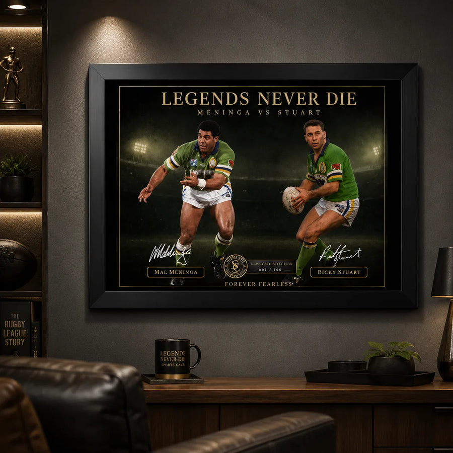 Meninga vs Stuart wall art displayed in a dark man cave with warm lighting and premium sports memorabilia styling.