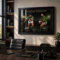 Meninga vs Stuart wall art displayed in a modern office above dark timber furniture and a black leather chair.