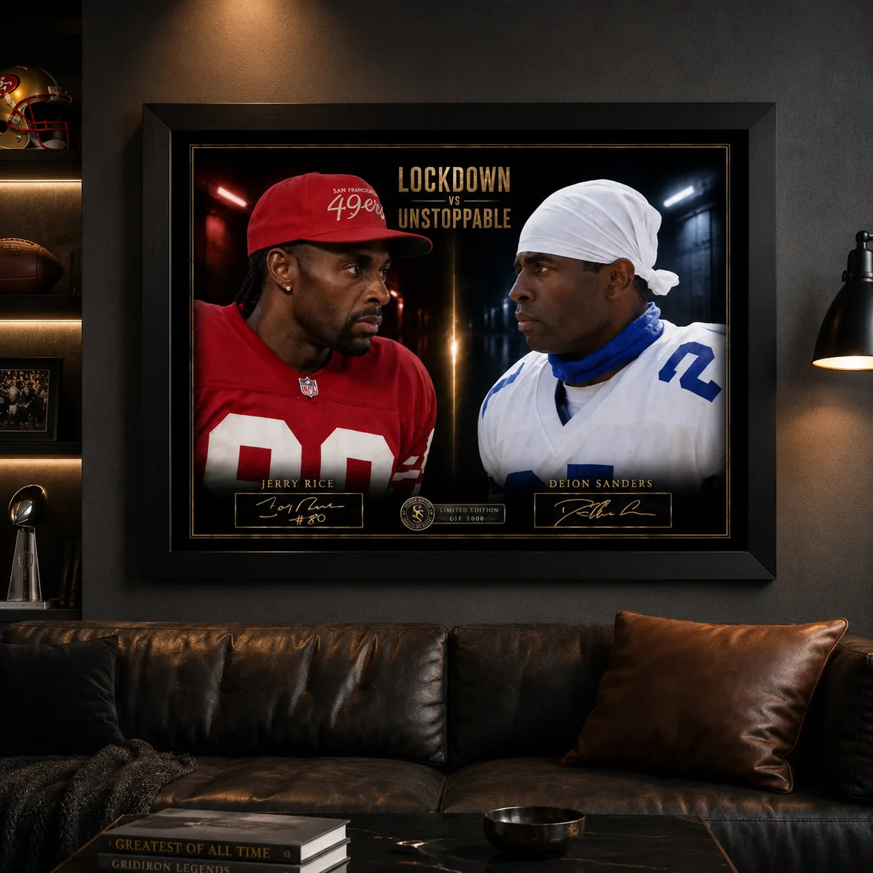 Black framed Jerry Rice and Deion Sanders NFL wall art displayed above a leather sofa in a dark sports man cave.