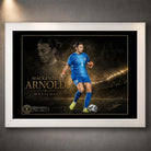 Mackenzie Arnold Matilda's sports wall art shown in a white frame with the full goalkeeper collector artwork visible.