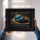 man holding a framed piece of dick Johnson crash by Sports Cave.