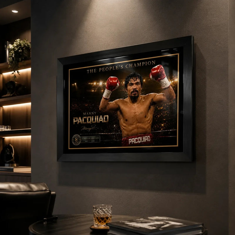 Black framed Manny Pacquiao boxing wall art displayed in a dark premium man cave with leather seating and spot lighting.