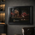 Marcus Rashford Manchester United framed sports wall art on a dark man cave wall beside shelves and a leather chair.