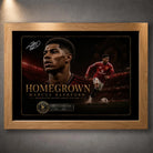 Marcus Rashford football wall art in an oak frame with dark stadium artwork.