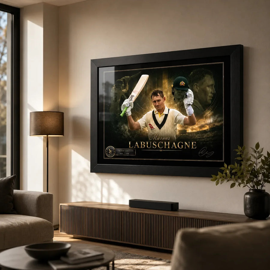 Marnus Labuschagne framed cricket wall art displayed in a warm modern living room above a timber entertainment unit.