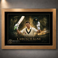 Marnus Labuschagne cricket wall art presented in a natural oak frame with black mount and gold collector accents.