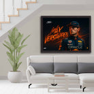 Framed sports art of Max Verstappen displayed in a modern living space, available now at www.sportscaveshop.com.