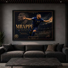 Modern luxury man cave featuring a framed Kylian Mbappé sports poster above a dark charcoal sofa with ambient lighting and minimalist interior styling.