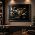 Michael Dunlop motorsport wall art in a dark premium man cave with warm lighting and collector styling.