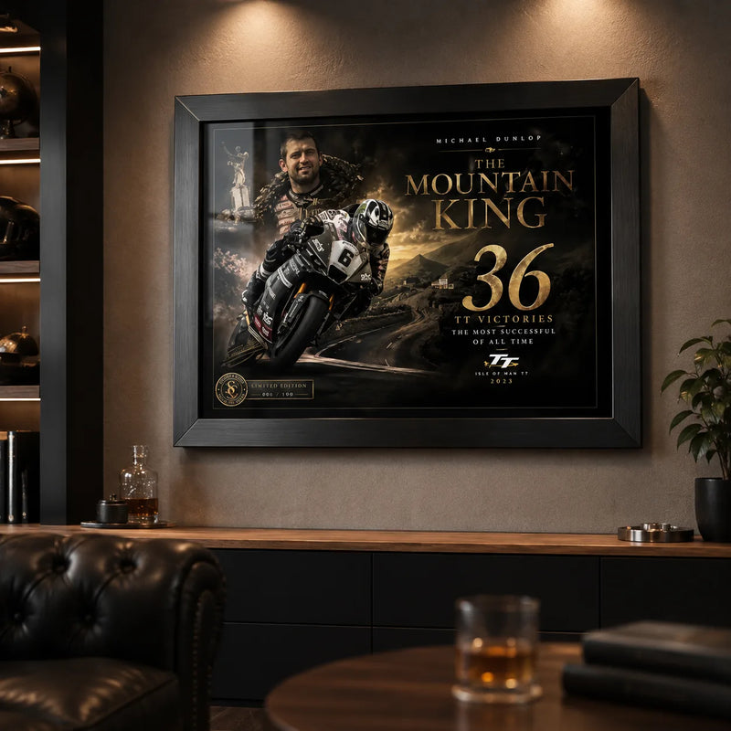 Michael Dunlop motorsport wall art in a dark premium man cave with warm lighting and collector styling.