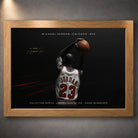 Oak framed Michael Jordan wall art showing Chicago No. 23 artwork on a dark grey wall.