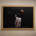 Oak framed artwork of NBA player Michael Jordan in a Chicago jersey with a dark background.