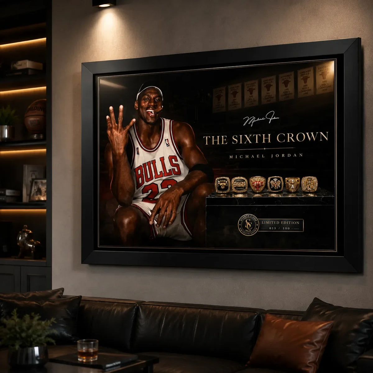 Michael Jordan wall art displayed in a dark man cave above leather seating with warm shelf lighting.