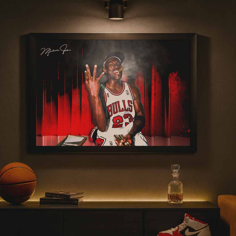 Framed Michael Jordan wall art on a dark wall under a spotlight—Bulls jersey, cigar celebration—premium framed sports art mockup for man cave wall décor.