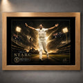 Mitchell Starc cricket wall art presented in a natural oak frame against a dark gallery wall.