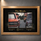 Motorsport rivalry wall art shown in an oak frame on a textured grey wall