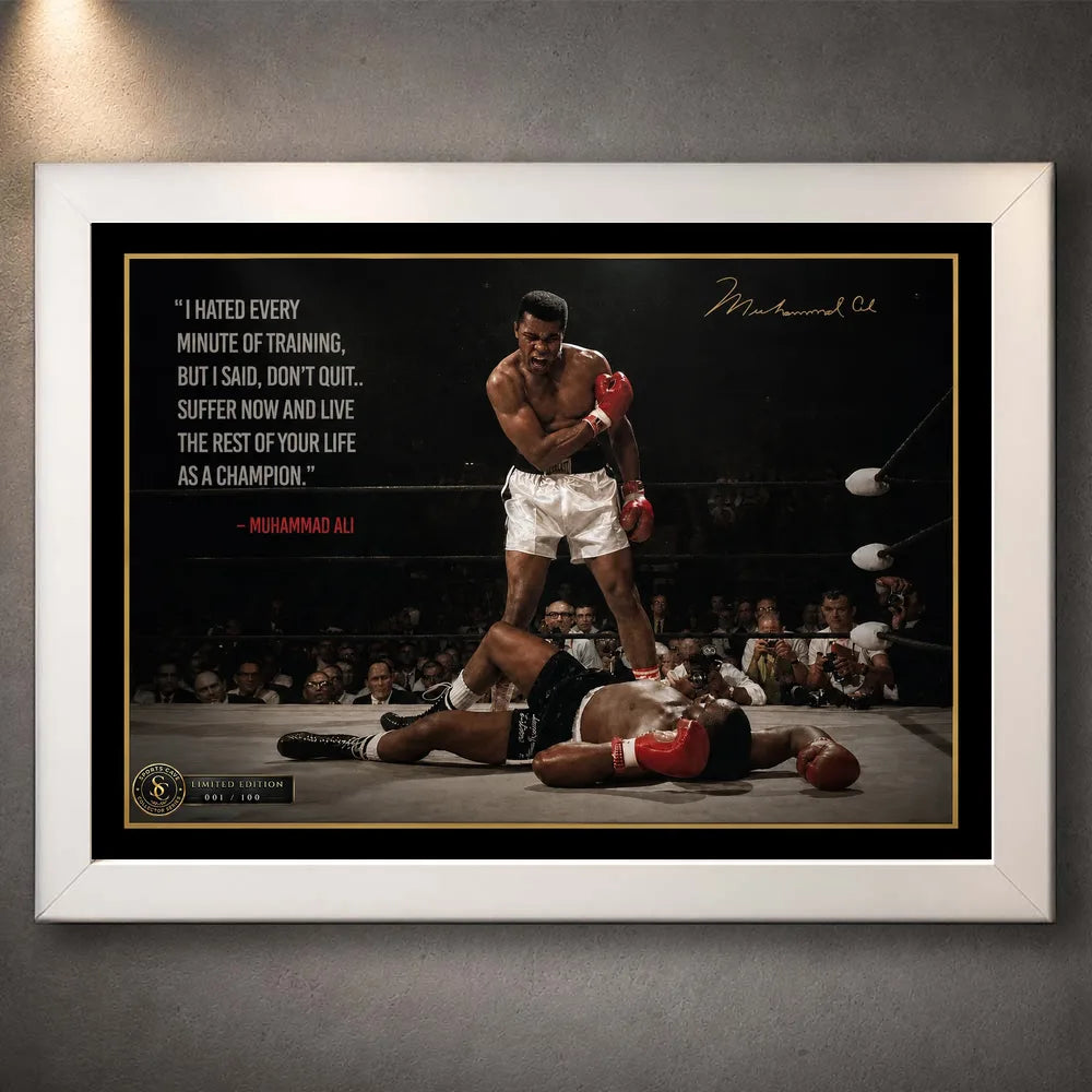 Muhammad Ali Live Like a Champion wall art in a white frame, featuring the iconic knockout scene and motivational quote.