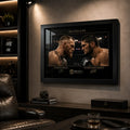 Black framed McGregor vs Khabib wall art styled in a dark man cave with UFC memorabilia and warm shelf lighting.