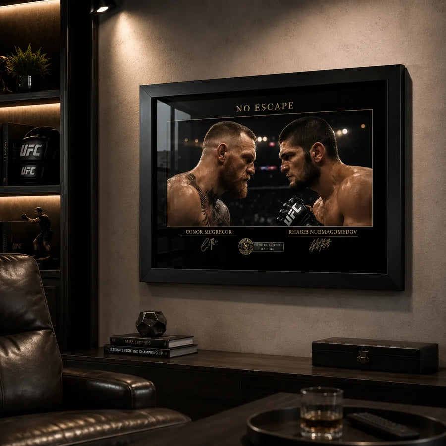 Black framed McGregor vs Khabib wall art styled in a dark man cave with UFC memorabilia and warm shelf lighting.