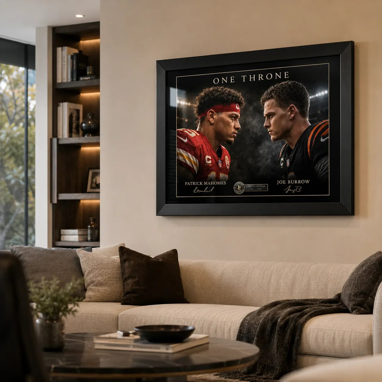 Black framed Mahomes vs Burrow wall art displayed above a neutral sofa in a modern living room.